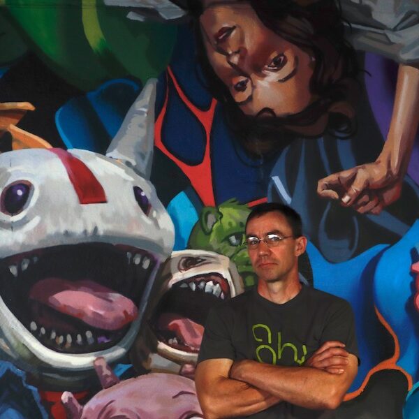 New Mural Showcases Wonderful Woes of Technology in Grove Street Parking Garage